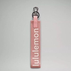 NWT Lululemon Never Lost Keychain in Pastel Pink/White Opal